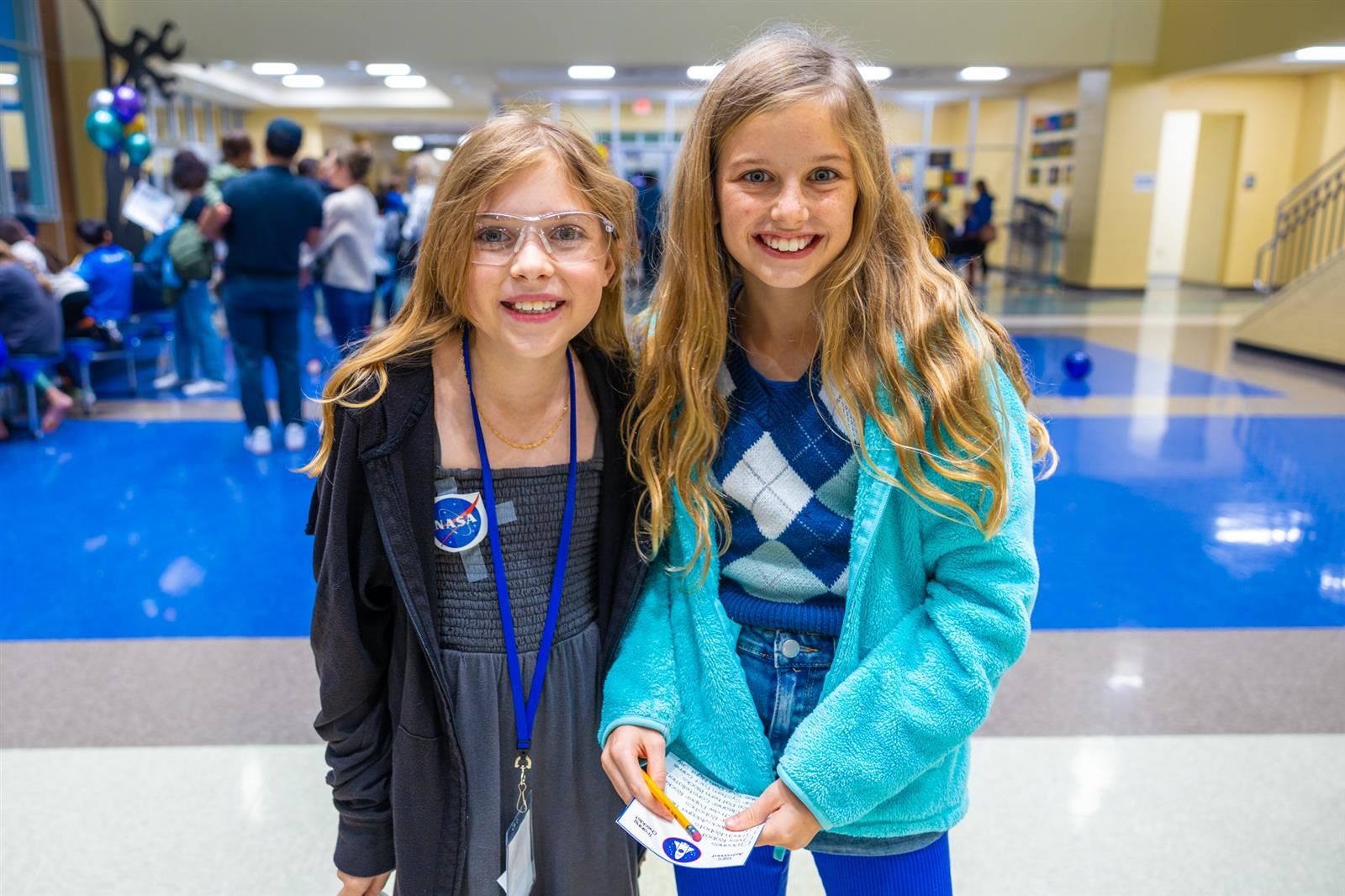 two girls smiling